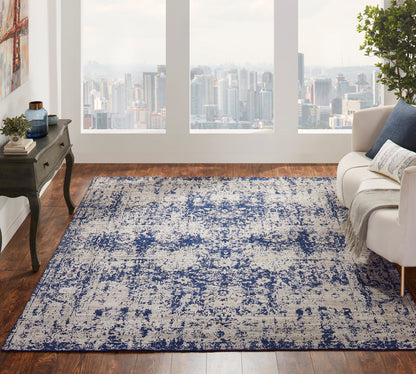 Blue and gray transitional wool-silk rug in room setting