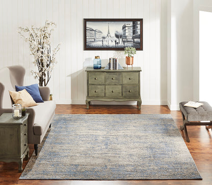 Blue and gray transitional wool-silk rug in room setting