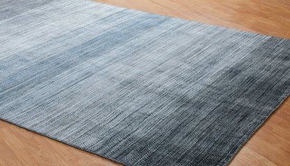 Round shape option, transitional wool-silk rug in blue