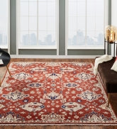 Rust and beige Southwest tribal rug in room setting