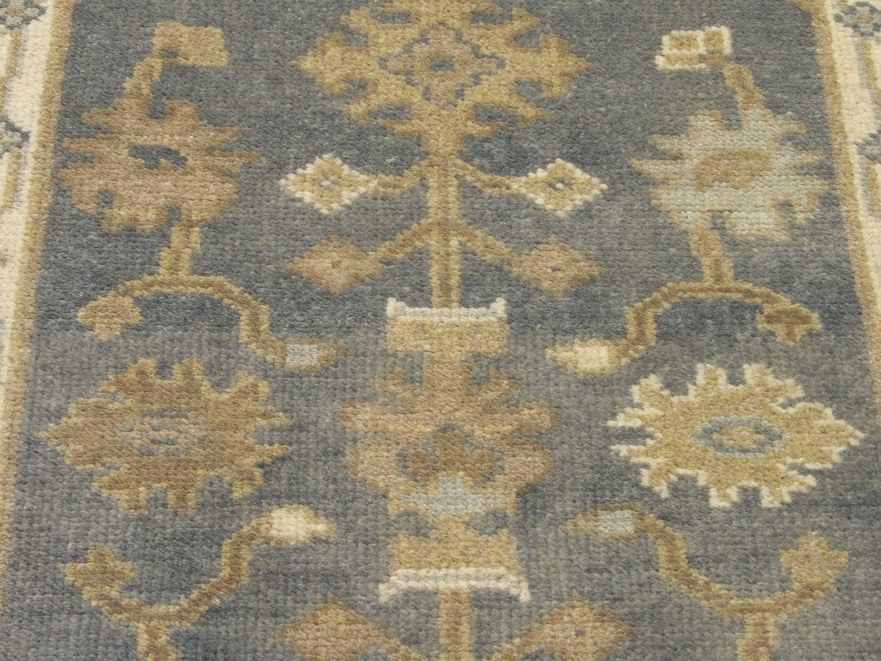 Natural dye wool texture close-up, Oushak runner