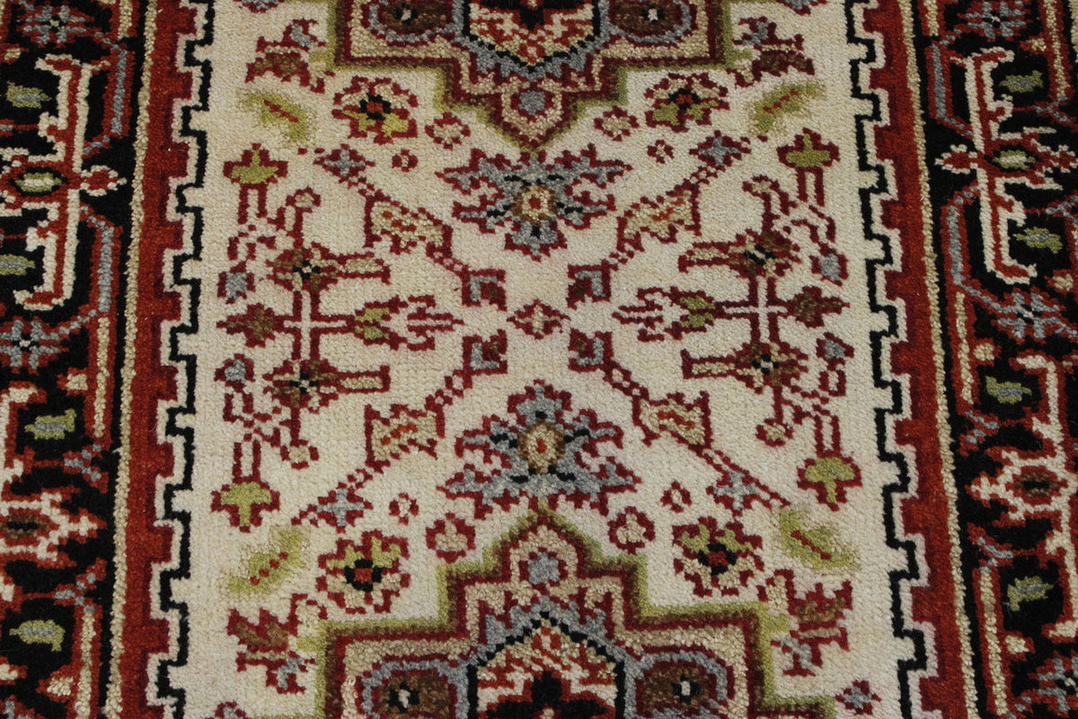 Tribal Heriz rug corner detail