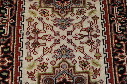Tribal Heriz rug corner detail