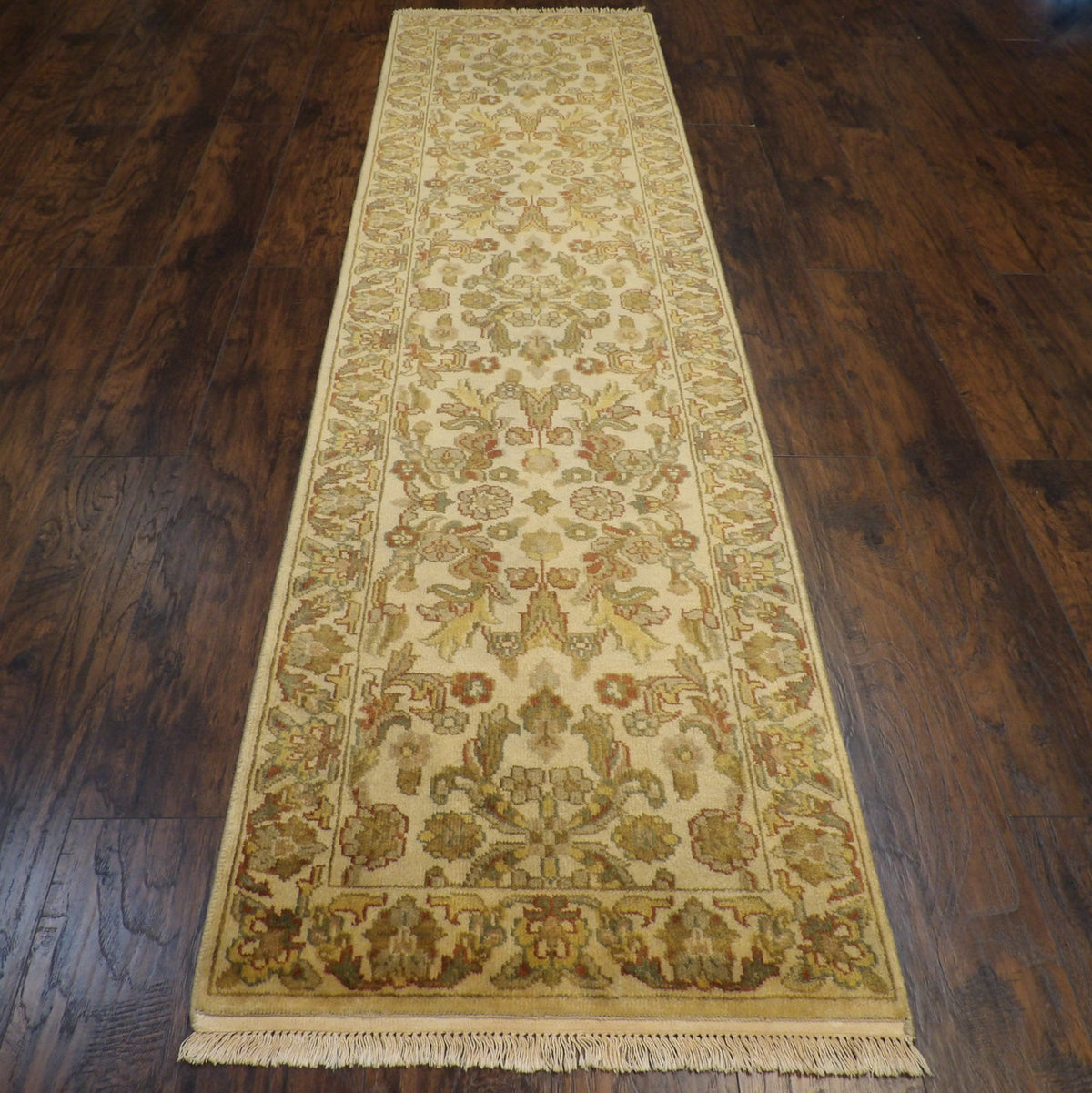 Close-up of wool pile, gold antique wash runner