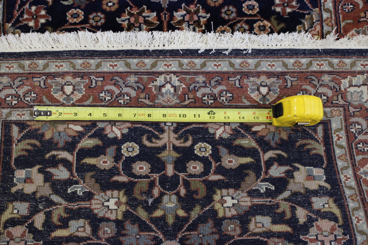 Blue Traditional Fine Heraki rug in room setting