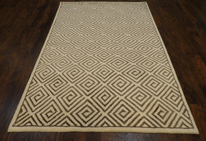 Close-up of wool pile, brown and ivory rug