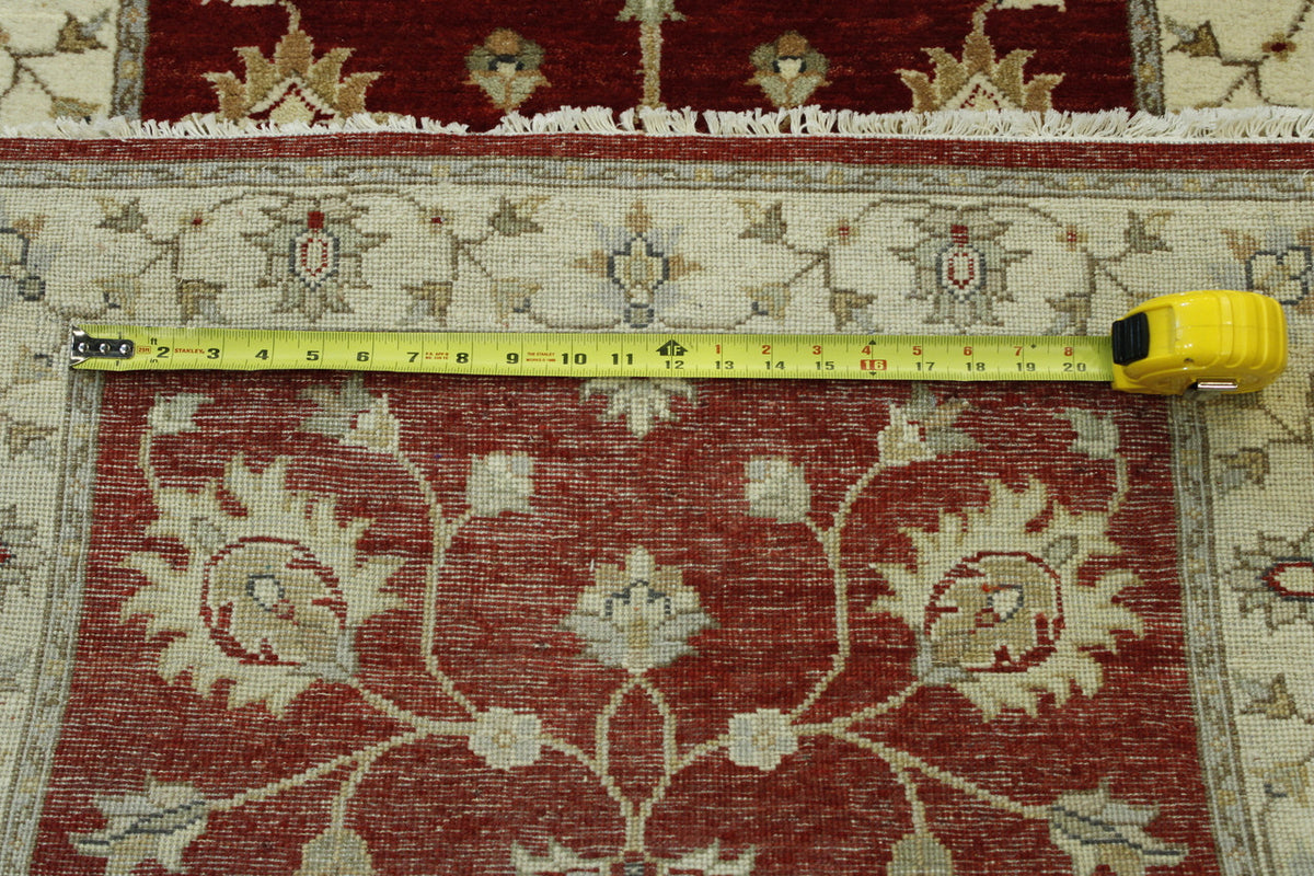 Red Traditional Indo Ziegler Chobi rug in room setting