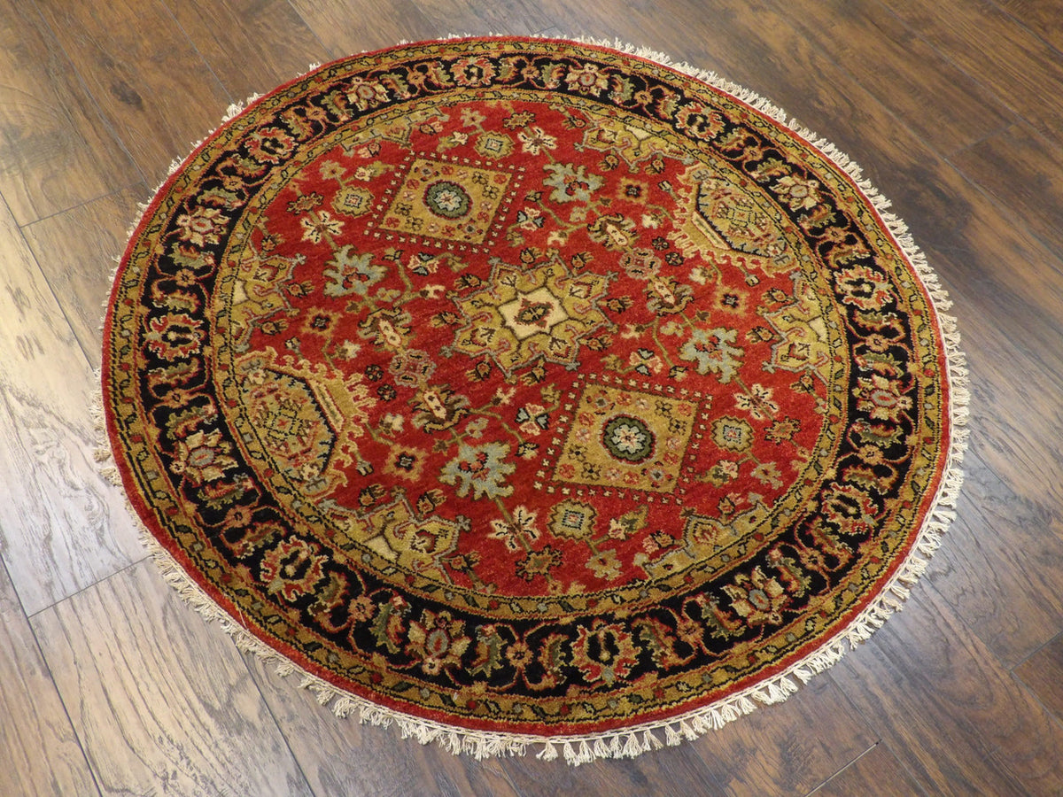 Full view of tribal Serapi round rug