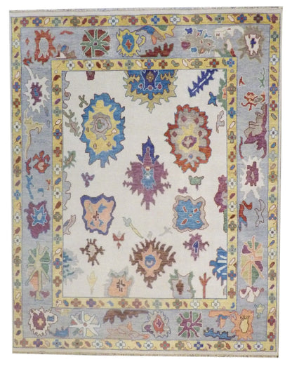 Colorful Turkish Oushak hand-knotted wool rug in blue and ivory, full view, 8x10