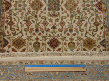 Beige & Teal Fine Persian Kashan rug in room setting