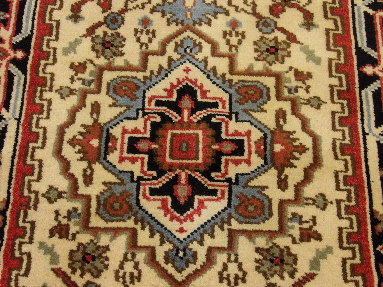 Wool texture close-up, tribal Heriz runner