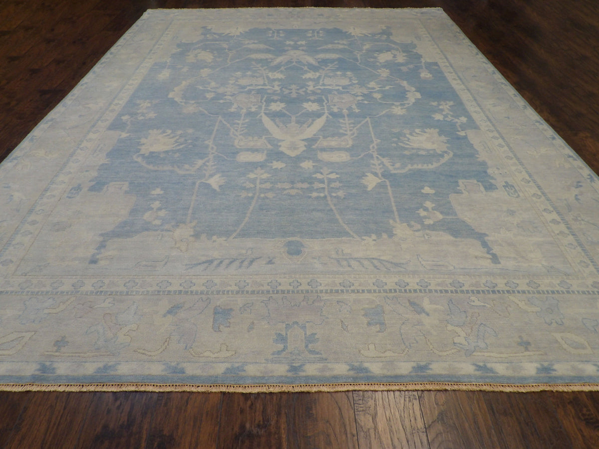 Back of Oushak hand-knotted rug