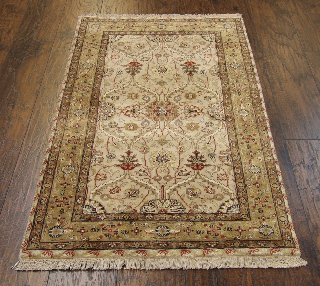 Kashan rug border detail, beige and green