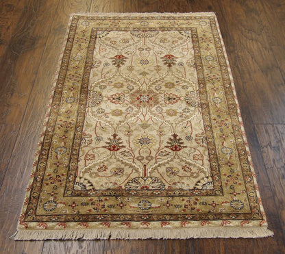 Kashan rug border detail, beige and green