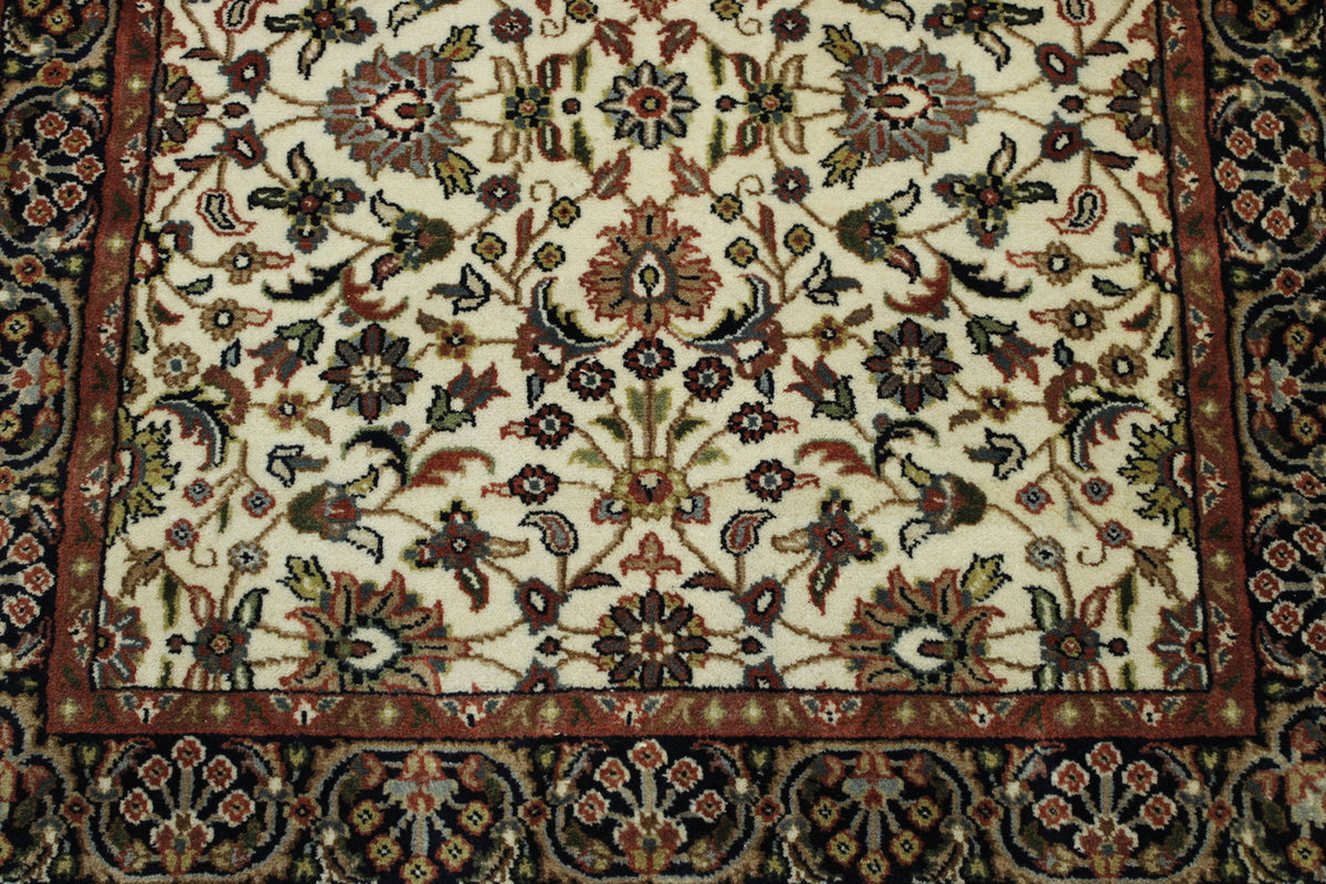 Blue & Beige Traditional Indo Mahal rug in room setting