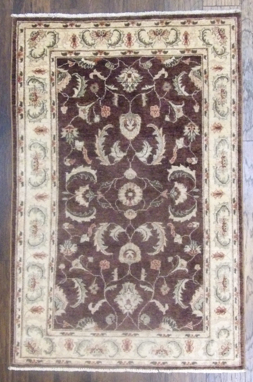 Oushak Chobi hand-knotted wool rug in brown and beige, full view