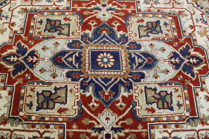Beige & Red Tribal Heriz rug in room setting