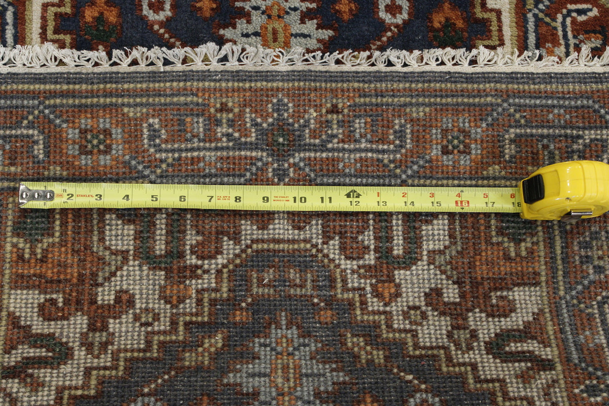 Tribal Indo Heriz rug corner detail
