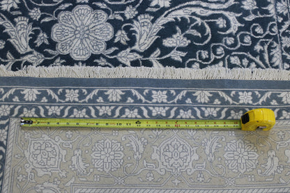 Blue & White Traditional Haji Jalili rug in room setting