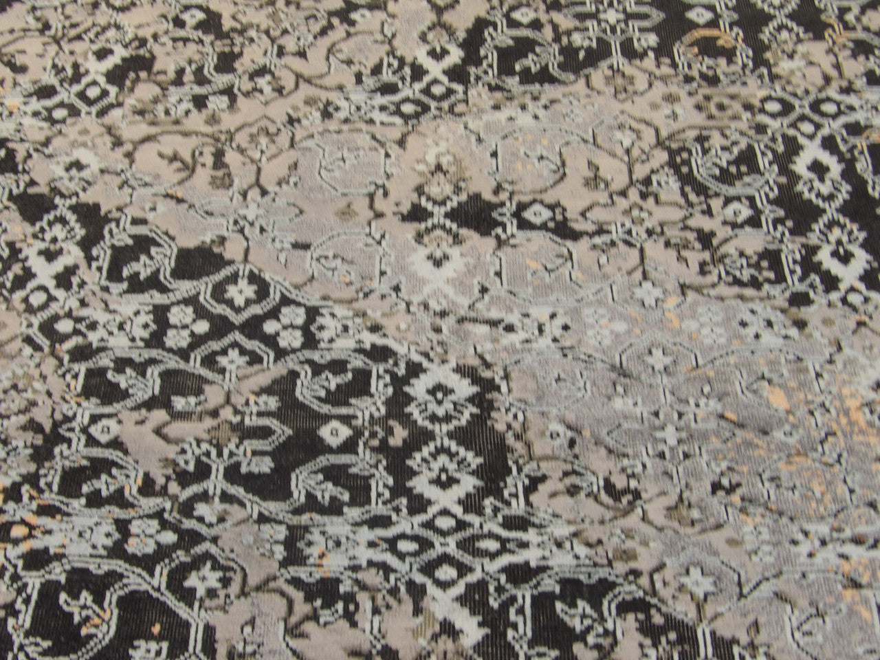 Back of transitional hand-knotted rug