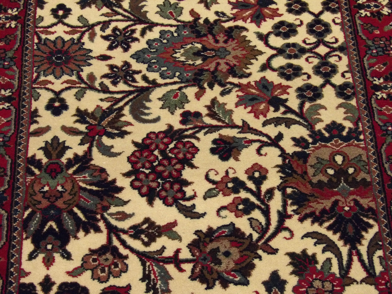 Back of Fine Persian Floral Mashad hand-knotted rug