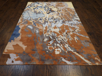 Close-up of carved wool texture, brown and multi-color rug