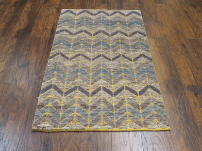 Close-up of wool pile, blue and gold rug