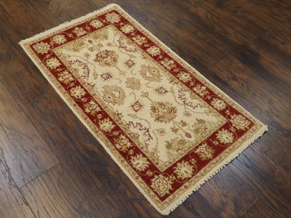 Beige and red Agra Ziegler rug in an entryway setting
