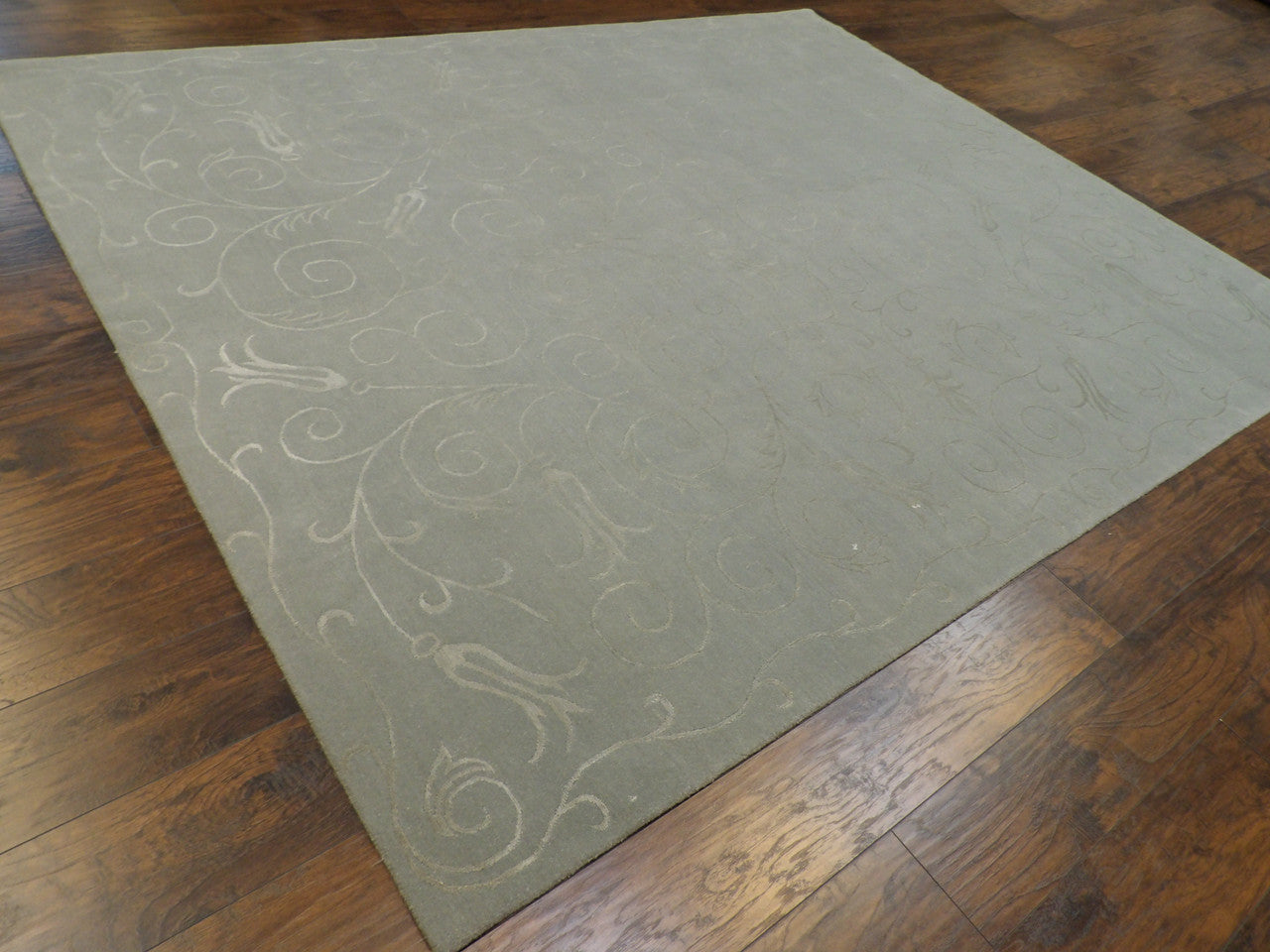 Blue transitional floral rug in a living room setting