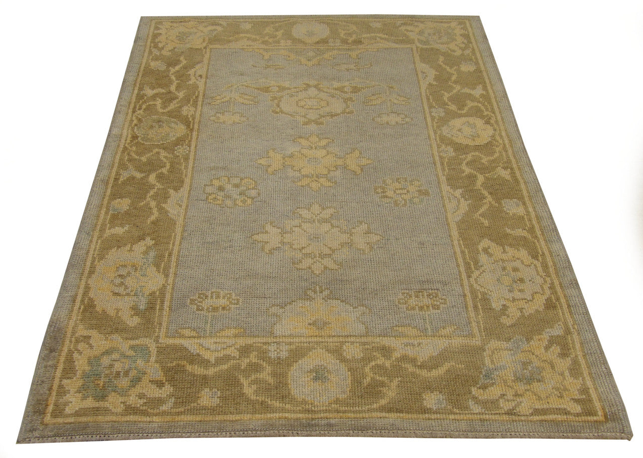 Back of hand-knotted vintage Oushak rug showing construction