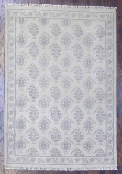 Tribal paisley Oushak hand-knotted wool rug in blue and beige, full view