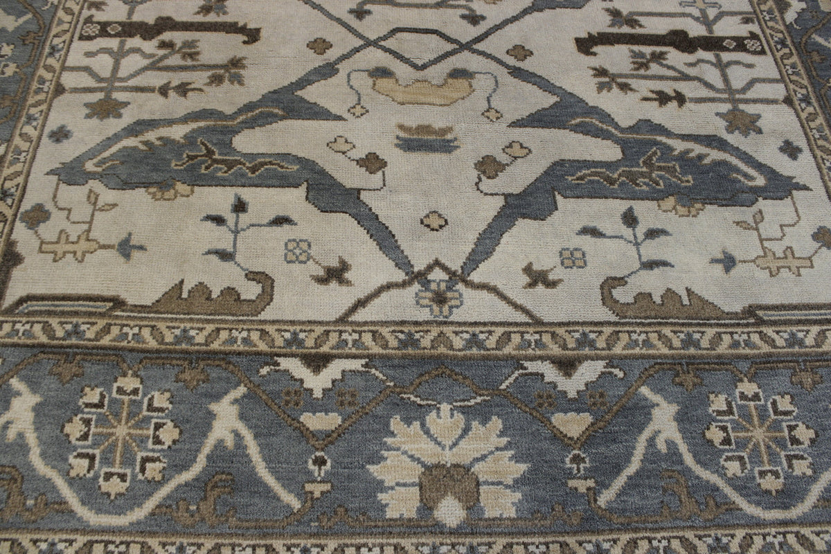 Green & Beige Oushak Ziegler rug in room setting