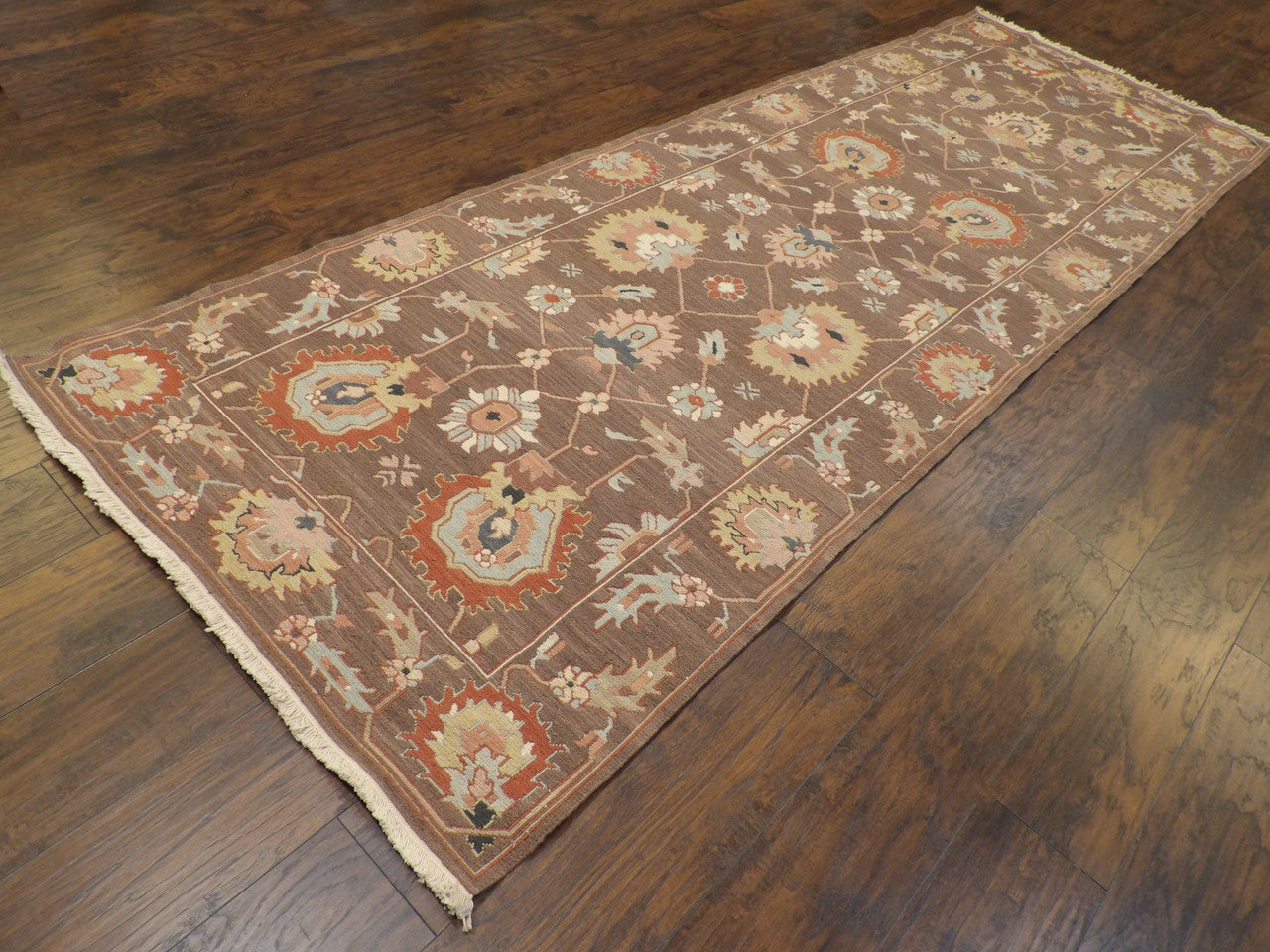 Soumak flatweave braided texture detail, brown runner