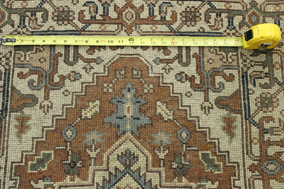 Beige & Rust Tribal Indo Heriz rug in room setting