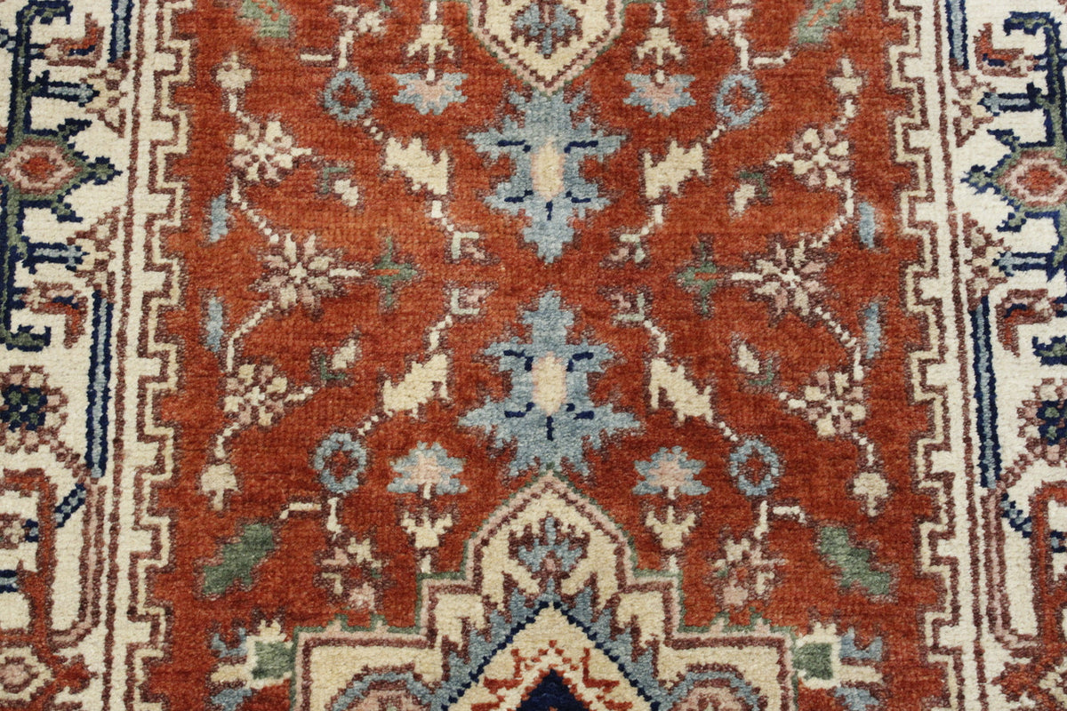 Tribal Heriz rug corner detail