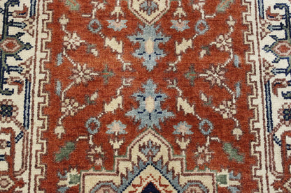 Tribal Heriz rug corner detail