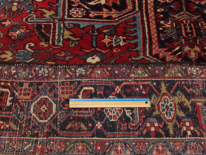 Blue and red Heriz rug in room setting
