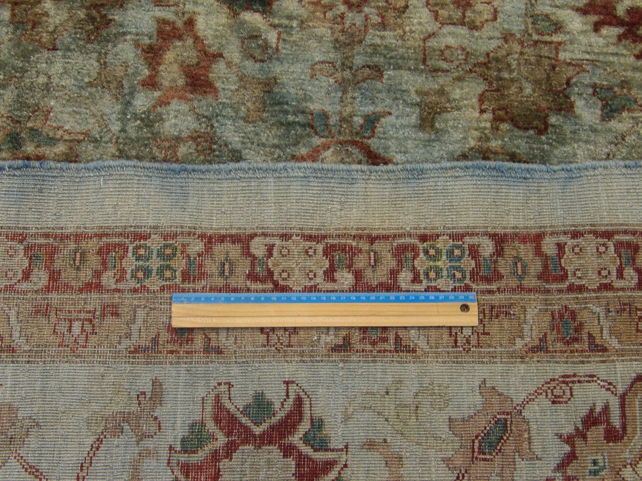 Teal Chobi Oushak rug in room setting
