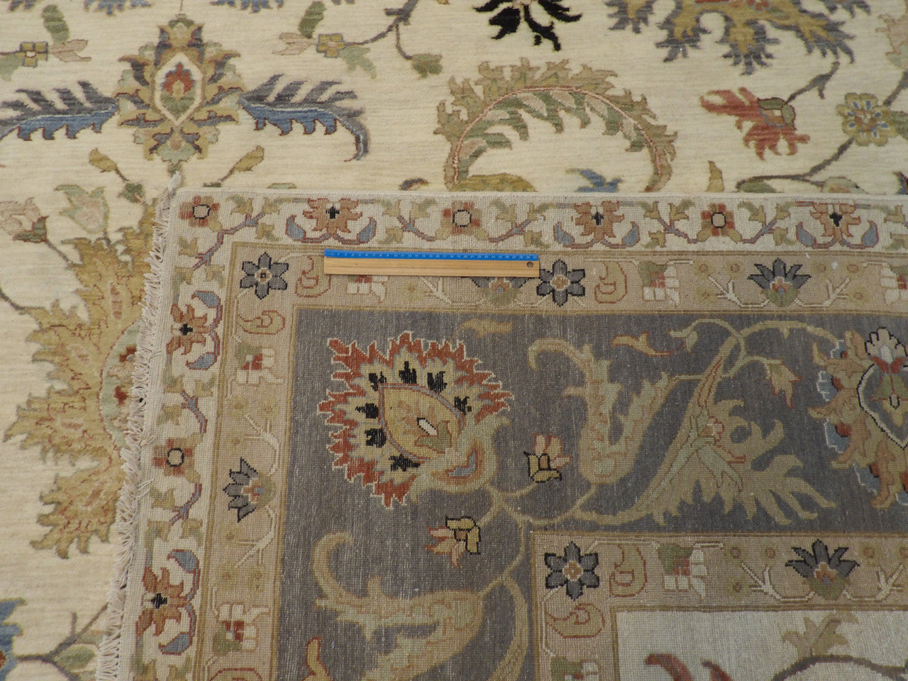 Blue & Ivory Agra Kashan rug in room setting