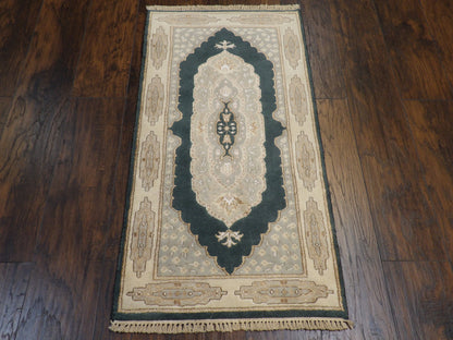 Close-up of wool-silk pile, Beige & Teal rug