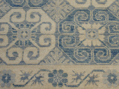 Tribal Khotan rug border detail