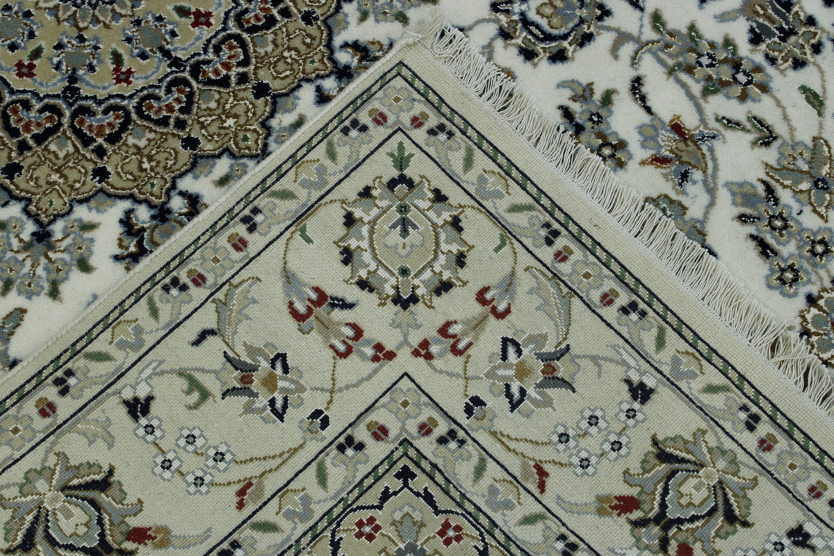 Traditional Fine Nain hand-knotted wool-silk rug in Beige, full view