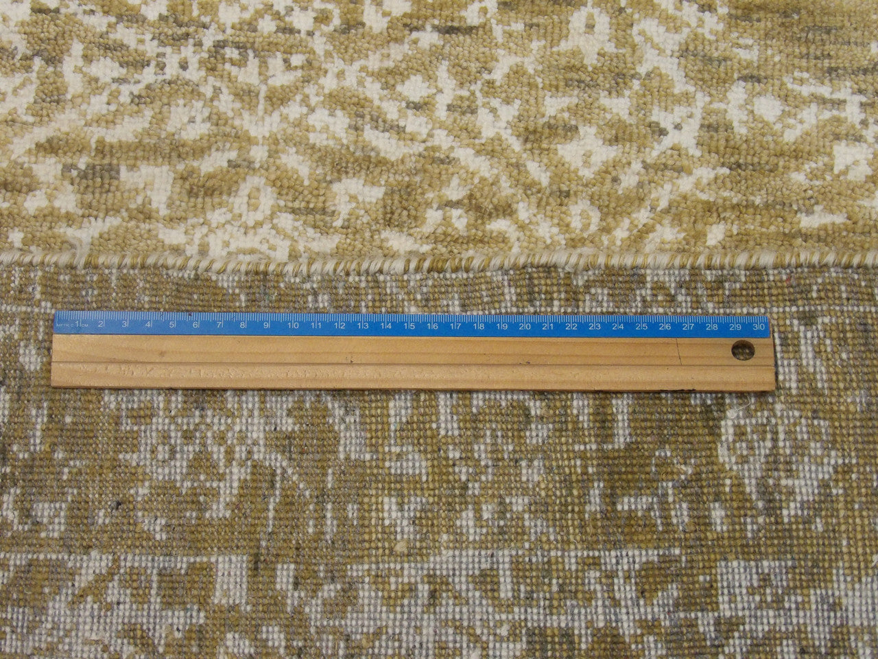 Green Transitional Broken rug in room setting