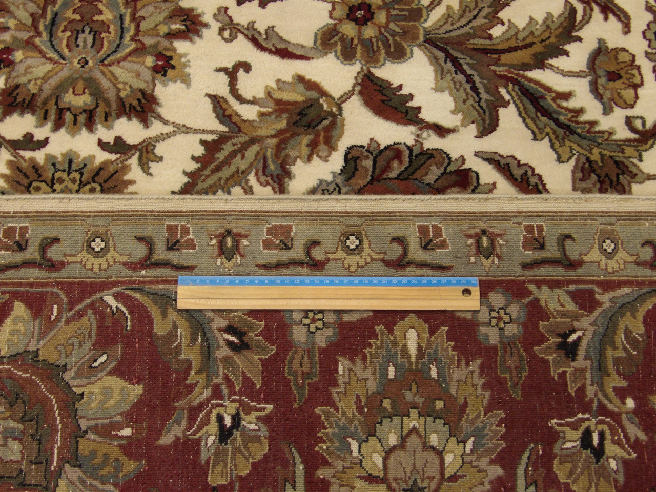 Beige and red Jaipur Kashan rug in room setting