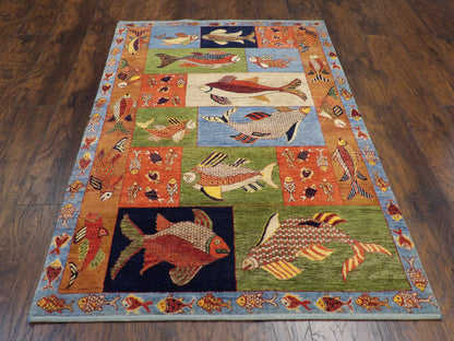 Close-up of wool pile, blue and rust coastal rug