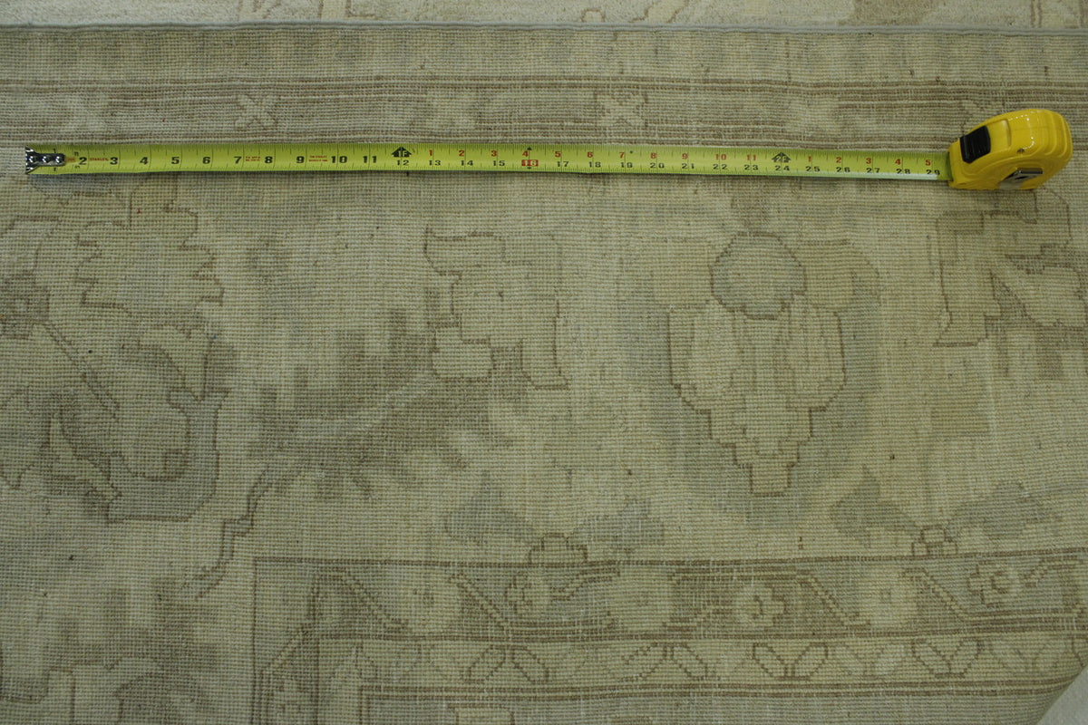 Close-up of wool pile, Green, Gray, Beige & Gold rug