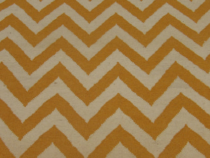 Coastal rug edge detail, gold and white