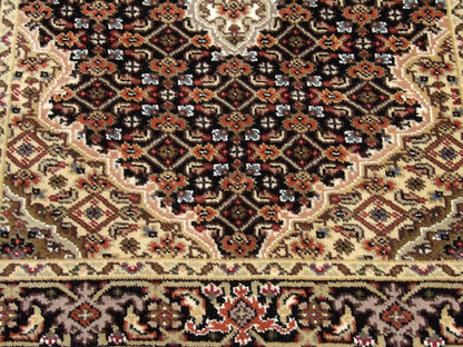 Tabriz runner border detail