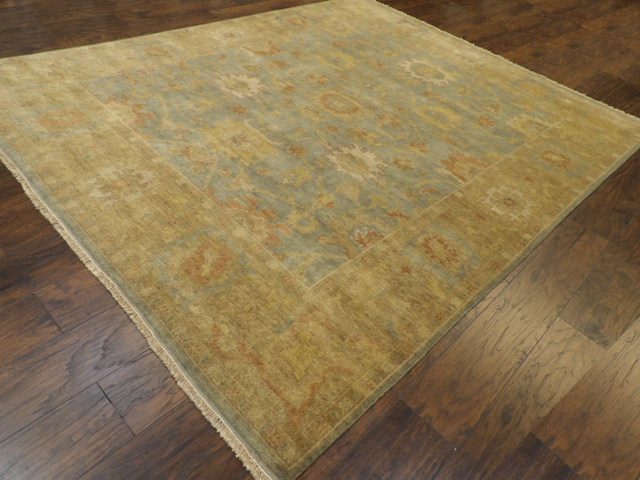 Oushak pattern detail, gold and green natural dye rug