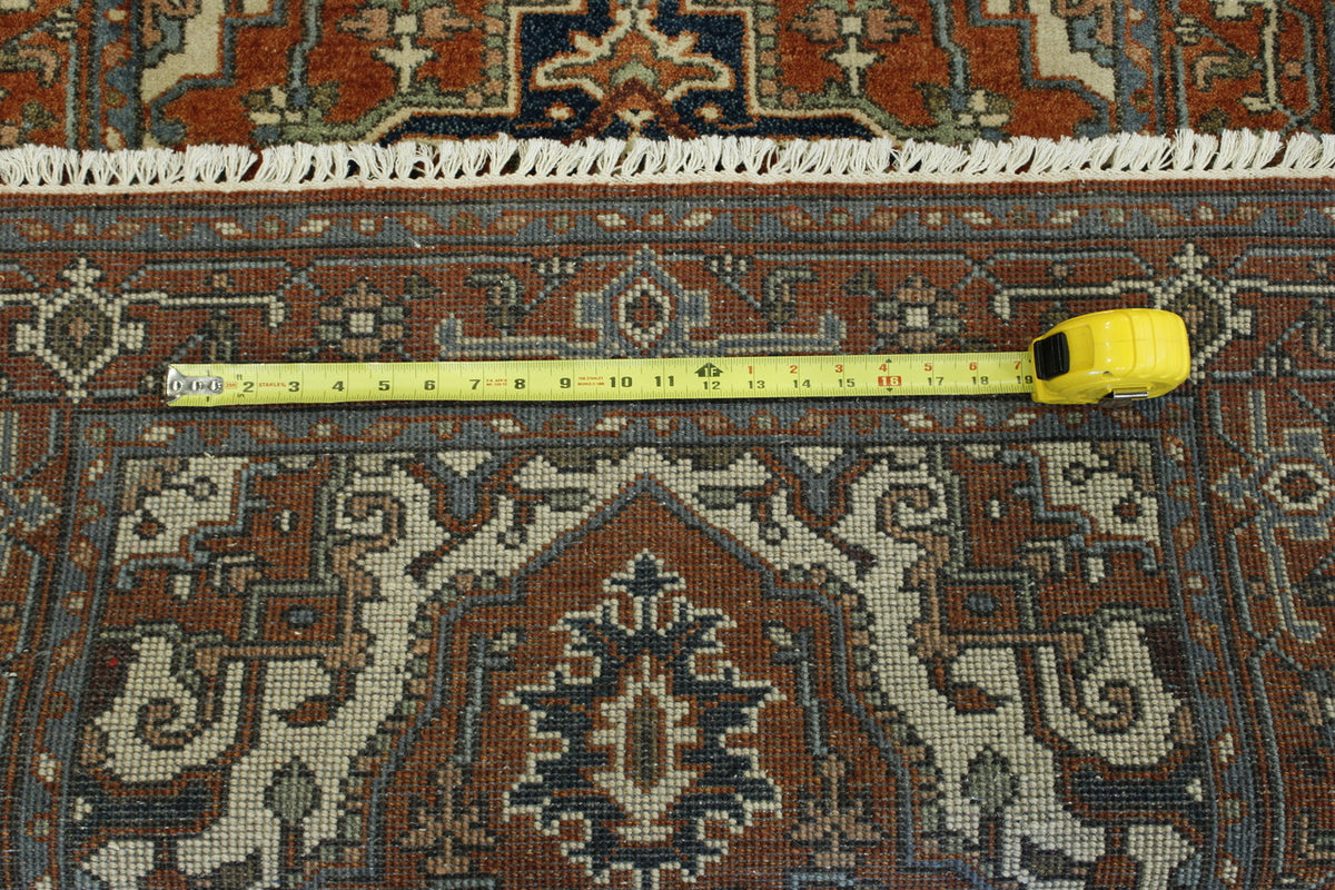 Rust Tribal Heriz rug in room setting